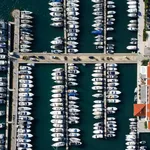 Yachts berthed at Marina Hramina with pontoons and calm harbour basin